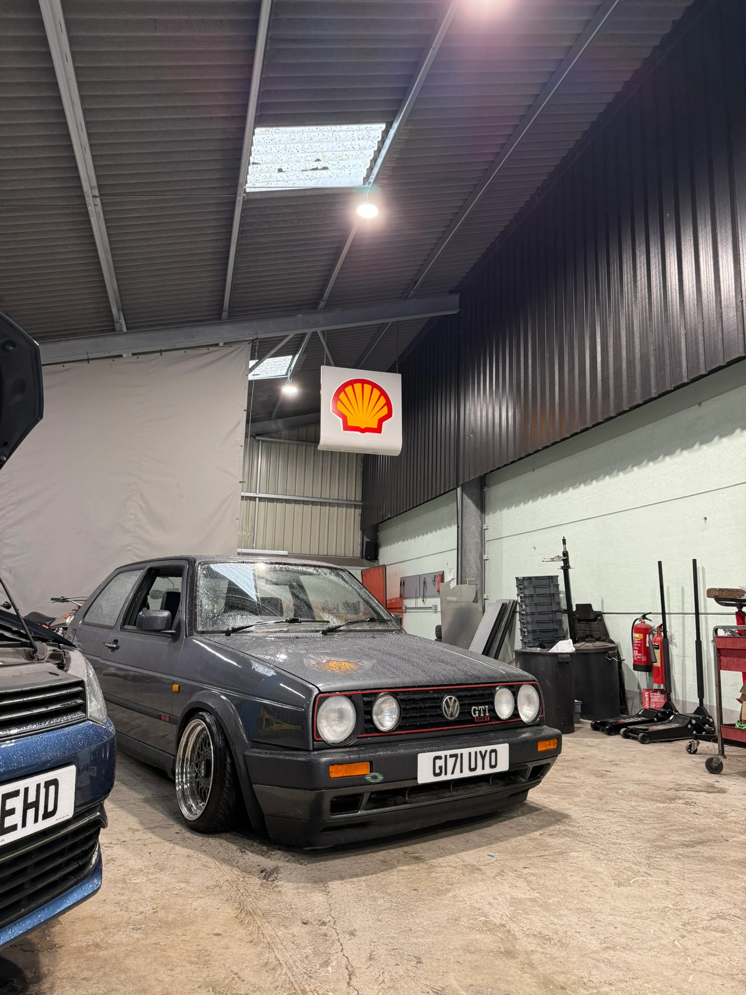 Workshop interior with classic cars